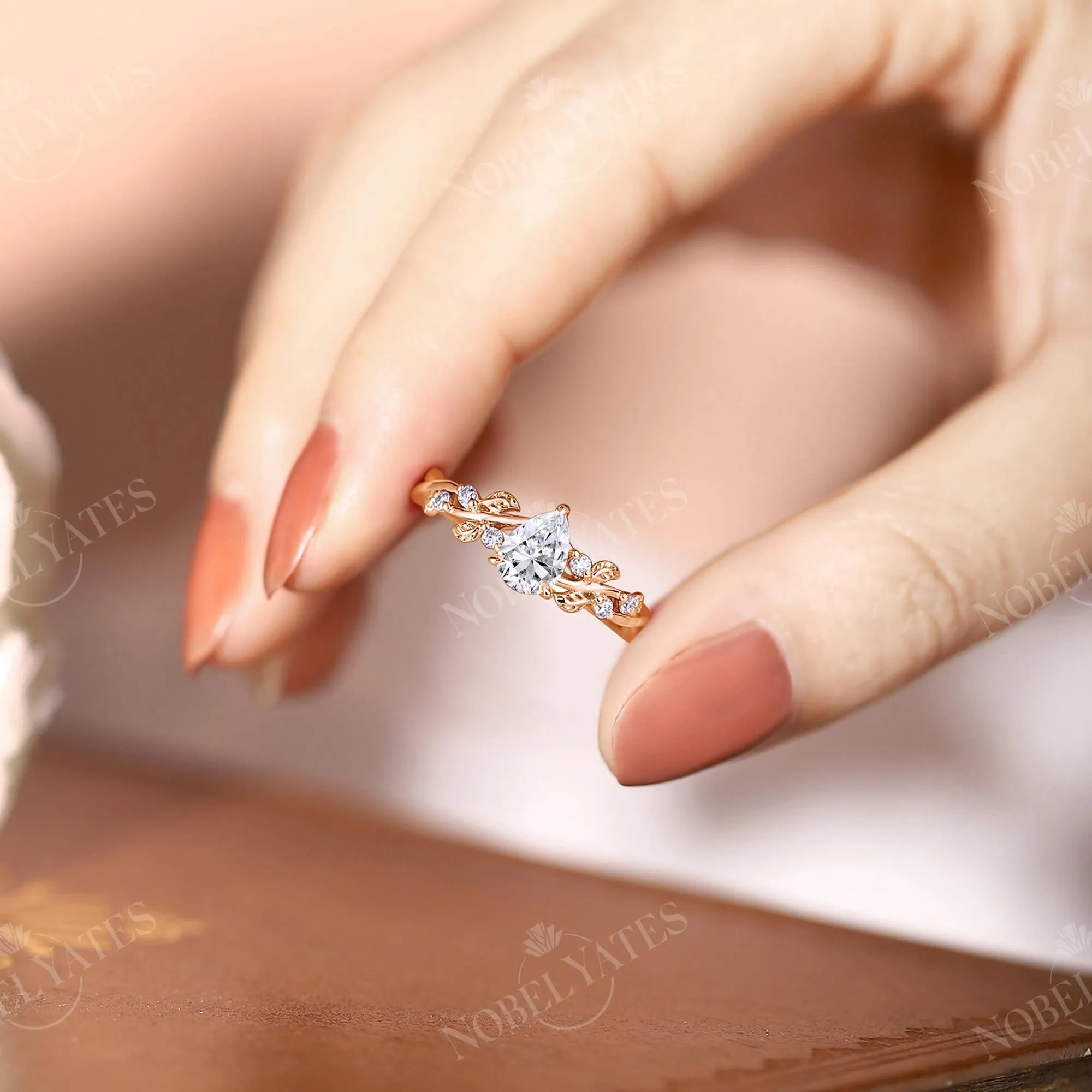 Pear Cut Moissanite Rose Gold Leaf Twist Design Engagement Ring