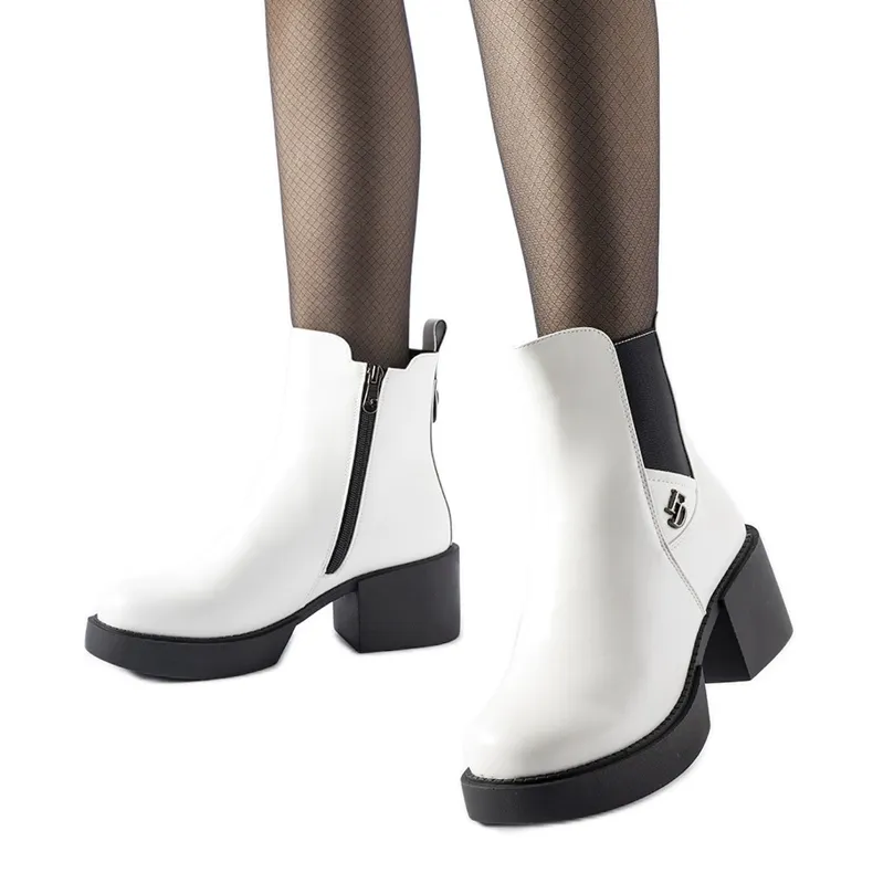 White insulated boots with a massive block